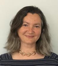 Headshot of Crina Frincu.