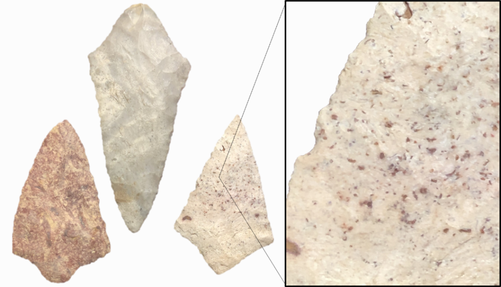 Three diamond-shaped arrowheads with broad, triangular points and short, contracting stems.